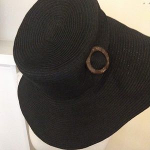 Wide brim floppy hat with wood buckle